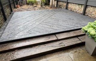 Millboard Composite Decking Installation in Back Garden by Wyldwood in Hampshire