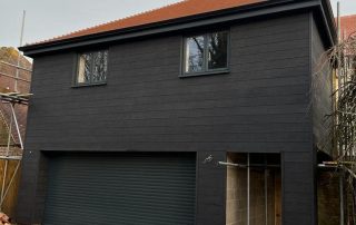 Millboard Black Composite Cladding Installation by Wyldwood in Hampshire