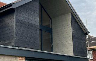 Millboard Black Composite Cladding Installation by Wyldwood in Hampshire