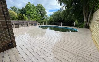 Millboard Composite Decking Installation for a Pool Surround by Wyldwood in Hampshire