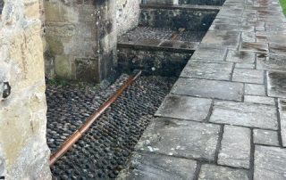 Lowered areas surrounding Salisbury Cathedral where decking is to be installed