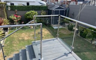 Decking Glass Balustrade Portsmouth 1 Composite decking stairway built to reach the back door of a garden in Portsmouth