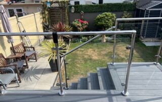 Decking Glass Balustrade Portsmouth 2 Composite decking stairway built to reach the back door of a garden in Portsmouth