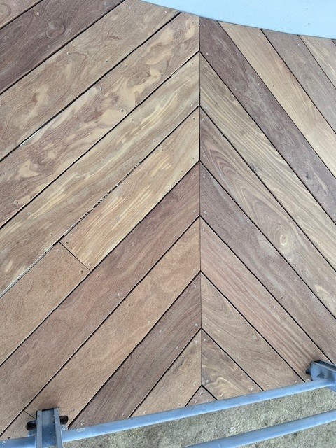 Hayling Island, Hampshire – Hayling Golf Club – Cumaru Wooden Decking 11 Close up of composite decking installed on a balcony at a golf club on Hayling Island