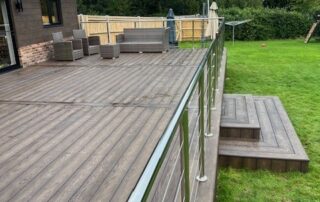 Millboard Composite Decking in Antique Oak Waterlooville 13 Large composite decking porch installed to a house in Waterlooville