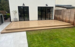 Millboard Composite Decking in Golden Oak Horley 1 Composite decking installed to a garden in Horley