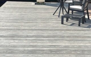 Millboard Composite Decking in Smoked Oak Farnham 1 Composite decking porch installed in Farnham