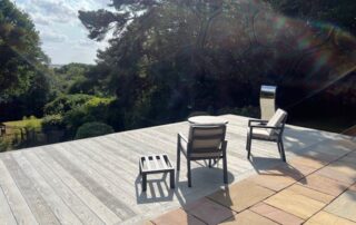 Millboard Composite Decking in Smoked Oak Farnham 10 Composite decking porch installed in Farnham