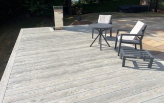 Millboard Composite Decking in Smoked Oak Farnham 3 Composite decking porch installed in Farnham