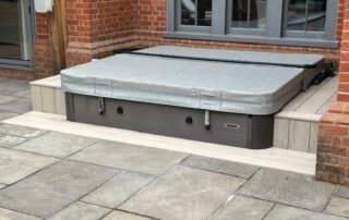 Millboard Composite Decking in Smoked Oak Hot Tub Chichester 1 Composite decking surrounding a hot tub in Chichester